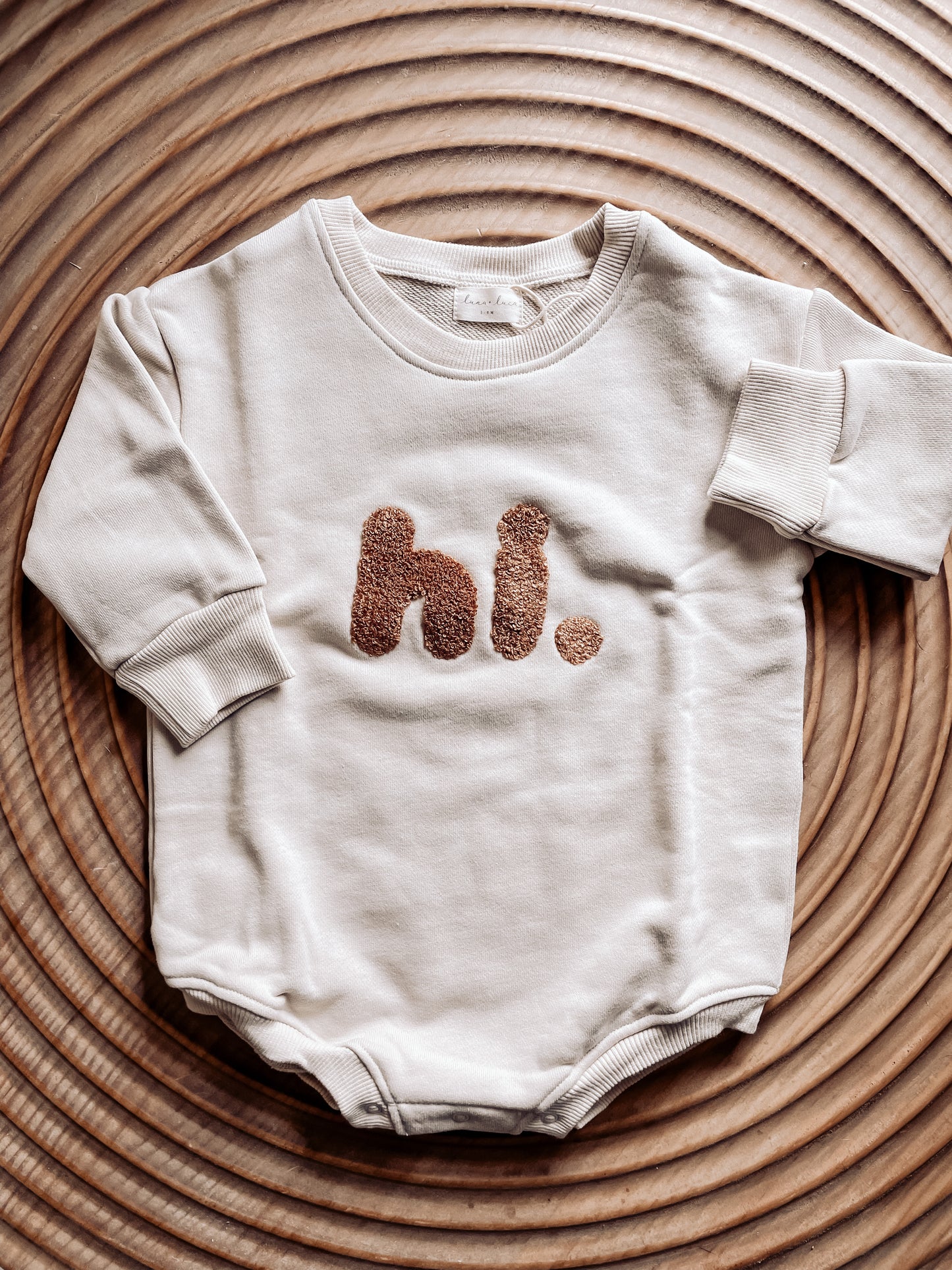 "hi." Graphic Romper for Infants